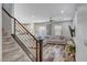 Open-concept living room showcasing hardwood floors and abundant natural light at 10397 Skye Canyon Falls Ave, Las Vegas, NV 89166