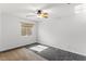Bedroom featuring a ceiling fan, carpet, and window with natural light at 1077 Lemongrass Ct, Henderson, NV 89002