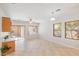 Bright dining area with tiled floors, sliding glass door, and large windows for natural light at 1077 Lemongrass Ct, Henderson, NV 89002