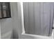 Bathroom featuring a shower with glass door and shower head and sleek vanity at 1301 Kingdom St, Las Vegas, NV 89117