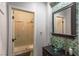 Stylish bathroom featuring modern sink, shower, and decorative green mosaic tile at 1301 Kingdom St, Las Vegas, NV 89117