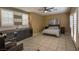 Unique suite with kitchenette, stylish furnishings, plantation shutters, and tile flooring at 1301 Kingdom St, Las Vegas, NV 89117