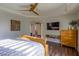Bedroom with wood floors and ceiling fan at 1301 Kingdom St, Las Vegas, NV 89117