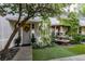 Inviting front entrance featuring a decorative wreath, lush greenery, and a charming water fountain at 1301 Kingdom St, Las Vegas, NV 89117