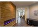 Hallway with electric fireplace and access to the bedroom at 1301 Kingdom St, Las Vegas, NV 89117