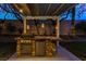 Well-equipped outdoor kitchen with a built-in grill, sink, and mini-fridge perfect for entertaining at 1301 Kingdom St, Las Vegas, NV 89117