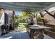 Outdoor kitchen and BBQ area under a covered patio, perfect for al fresco dining and entertaining at 1301 Kingdom St, Las Vegas, NV 89117