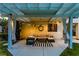 Cozy outdoor patio area with comfortable seating, stylish decor, and ambient lighting at 1301 Kingdom St, Las Vegas, NV 89117