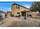Backyard featuring a patio area and spacious desert landscaping, great for outdoor living at 2265 Stone Breeze Ave, North Las Vegas, NV 89031