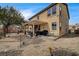 Spacious backyard with covered patio and barbecue area, perfect for entertaining at 2265 Stone Breeze Ave, North Las Vegas, NV 89031