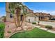 Charming two-story home with a landscaped yard and a welcoming entrance at 2265 Stone Breeze Ave, North Las Vegas, NV 89031