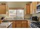 Granite countertops in this kitchen, complete with modern appliances at 2265 Stone Breeze Ave, North Las Vegas, NV 89031