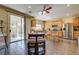 Eat-in kitchen with stainless steel appliances and backyard patio access at 2265 Stone Breeze Ave, North Las Vegas, NV 89031