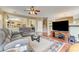 Spacious living room boasts hardwood floors, ceiling fan, and open floor plan at 2265 Stone Breeze Ave, North Las Vegas, NV 89031