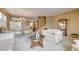 Comfortable living room and dining area featuring neutral tones and stylish furniture at 2265 Stone Breeze Ave, North Las Vegas, NV 89031