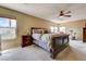 Bright main bedroom with large windows, ceiling fan, and ample space at 2265 Stone Breeze Ave, North Las Vegas, NV 89031