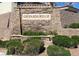 Attractive stone community sign for Granada Ridge set amongst professionally landscaped greenery and shrubbery at 2265 Stone Breeze Ave, North Las Vegas, NV 89031