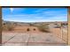 An expansive backyard with desert landscaping and a view of mountains offering peace and tranquility at 260 Haley Way # 157, Mesquite, NV 89027