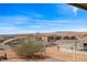 Backyard with desert landscaping and views of the surrounding landscape, showcasing community living at 260 Haley Way # 157, Mesquite, NV 89027