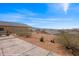 Spacious backyard with desert landscaping and a concrete patio, perfect for outdoor entertaining at 260 Haley Way # 157, Mesquite, NV 89027