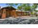 Community clubhouse with a covered entrance, native desert landscaping, and inviting outdoor space at 260 Haley Way # 157, Mesquite, NV 89027