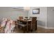 Dining room with table, chairs, bench seating, and view to living area at 260 Haley Way # 157, Mesquite, NV 89027