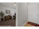 Inviting entryway with neutral paint, decor, and views into a bedroom or office space at 260 Haley Way # 157, Mesquite, NV 89027