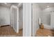 Well-lit hallway offers access to the bathroom, laundry, and other rooms at 260 Haley Way # 157, Mesquite, NV 89027
