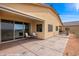 Back patio features sliding glass doors and seating for outdoor relaxation and entertainment at 260 Haley Way # 157, Mesquite, NV 89027