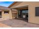 Back patio featuring sliding glass doors with a covered patio for outdoor enjoyment at 260 Haley Way # 157, Mesquite, NV 89027