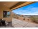 Outdoor patio with seating, offering beautiful views of the neighborhood and surrounding landscape at 260 Haley Way # 157, Mesquite, NV 89027