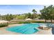 Resort-style pool with a tanning shelf and hot tub provide a luxurious experience with scenic neighborhood views at 260 Haley Way # 157, Mesquite, NV 89027