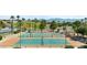 Aerial view of the community's well-maintained tennis and basketball courts offers an active lifestyle at 260 Haley Way # 157, Mesquite, NV 89027