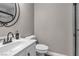 Bathroom with a white vanity, a decorative mirror, and a walk-in shower at 3088 Via Flaminia Ct, Henderson, NV 89052