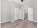 Bedroom boasts neutral walls, wood laminate flooring and closet with double doors at 3088 Via Flaminia Ct, Henderson, NV 89052