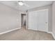 Bedroom with plush carpet, ceiling fan, closet and bright window with shutters at 3088 Via Flaminia Ct, Henderson, NV 89052