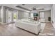 Living room with fireplace, plantation shutters, and sliding doors to the backyard at 3088 Via Flaminia Ct, Henderson, NV 89052