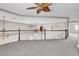 Carpeted loft area with decorative lighting, open to lower level with white railing at 3088 Via Flaminia Ct, Henderson, NV 89052