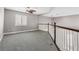 Cozy loft boasts new carpet, custom railing, and natural light from window at 3088 Via Flaminia Ct, Henderson, NV 89052