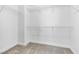 A walk-in closet with wire shelving for optimal storage and organization at 3088 Via Flaminia Ct, Henderson, NV 89052