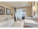 Luxurious bathroom featuring a soaking tub, double sinks, and stylish décor at 3750 Las Vegas Blvd # 3510, Las Vegas, NV 89158