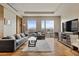 Modern living room with plush seating, city views, and hardwood floors at 3750 Las Vegas Blvd # 3510, Las Vegas, NV 89158