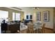 Cozy living and dining area with floor-to-ceiling windows and stylish furniture at 3750 Las Vegas Blvd # 3510, Las Vegas, NV 89158