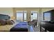 Bright bedroom with city views, a sitting area, and modern furnishings at 3750 Las Vegas Blvd # 3510, Las Vegas, NV 89158