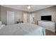 Bedroom with large dresser and TV at 3823 S Maryland Pkwy # T8, Las Vegas, NV 89119