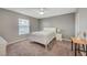 Bright bedroom with ceiling fan and natural light at 3823 S Maryland Pkwy # T8, Las Vegas, NV 89119