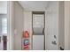 Laundry closet featuring a stacked washer and dryer at 3823 S Maryland Pkwy # T8, Las Vegas, NV 89119