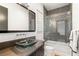 Stylish bathroom with a vessel sink, modern fixtures, and a shower over tub at 39 Coralwood Dr, Las Vegas, NV 89135