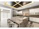 Modern kitchen featuring an oversized island, stainless steel appliances, and ample natural light at 39 Coralwood Dr, Las Vegas, NV 89135