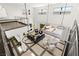An aerial view showcasing the elegant layout of the living area with access to the stylish outdoor features at 39 Coralwood Dr, Las Vegas, NV 89135